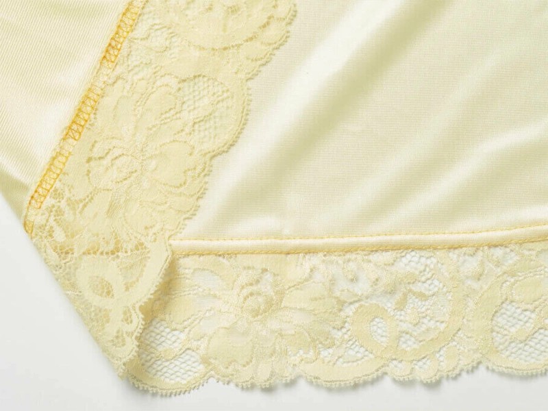 Foot for hemming and sewing lace to Bernette renders and coverlocks Foot for hemming and sewing lace to Bernette renders and coverlocks