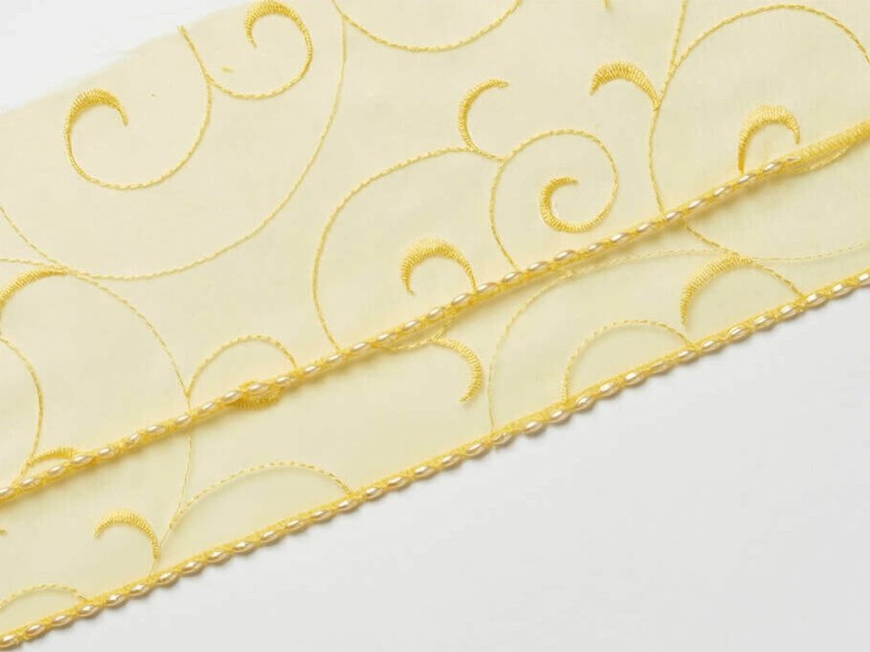 Stopka do przyszywania cekinów i koralików na owerloku Bernette