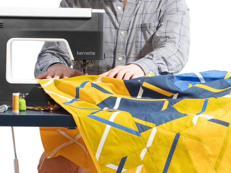 Slide-on table to expand workspace for Bernette sewing machines