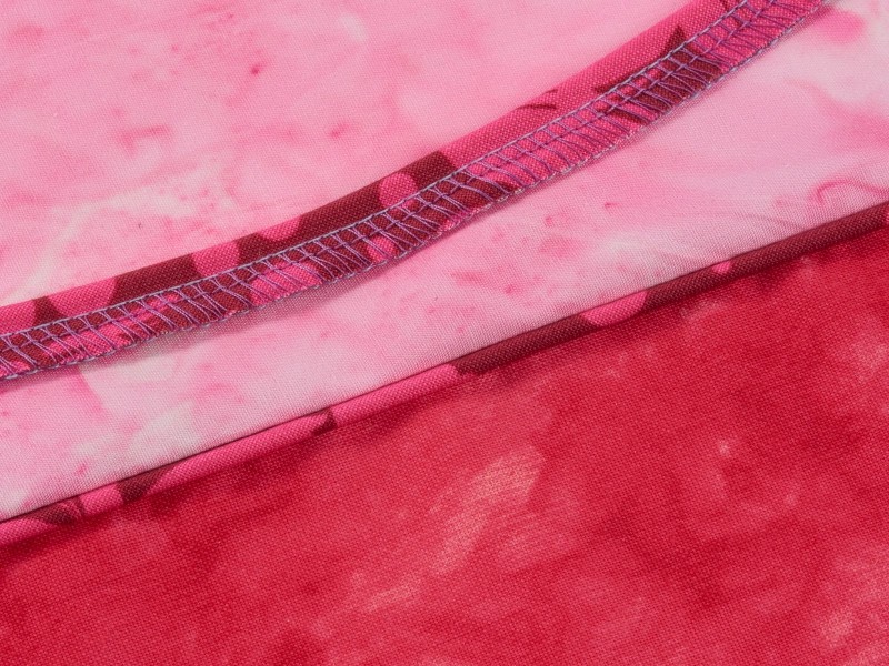 Foot for sewing decorative strings into the edge of the material - so-called piping. Foot for sewing decorative strings into the edge of the material - so-called piping.