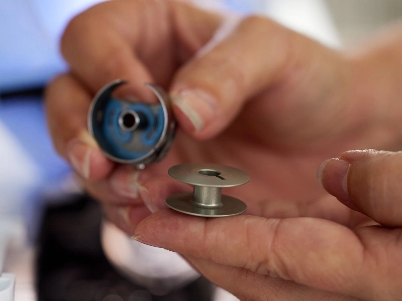 Original bobbin case for the Bernette b08 sewing machine